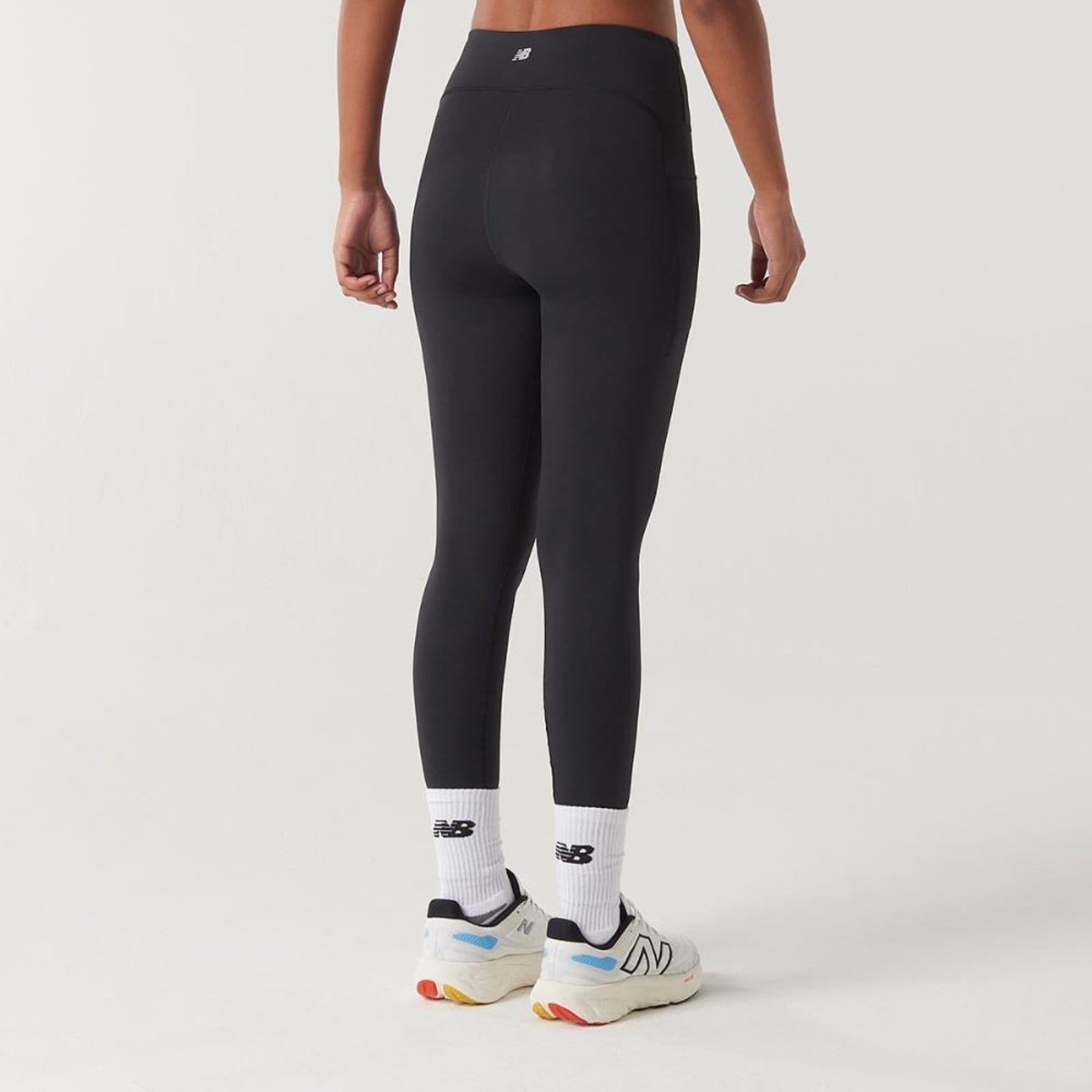 Vista 2 Legging Rc Pocket 25" Feminina" New Balance incolor