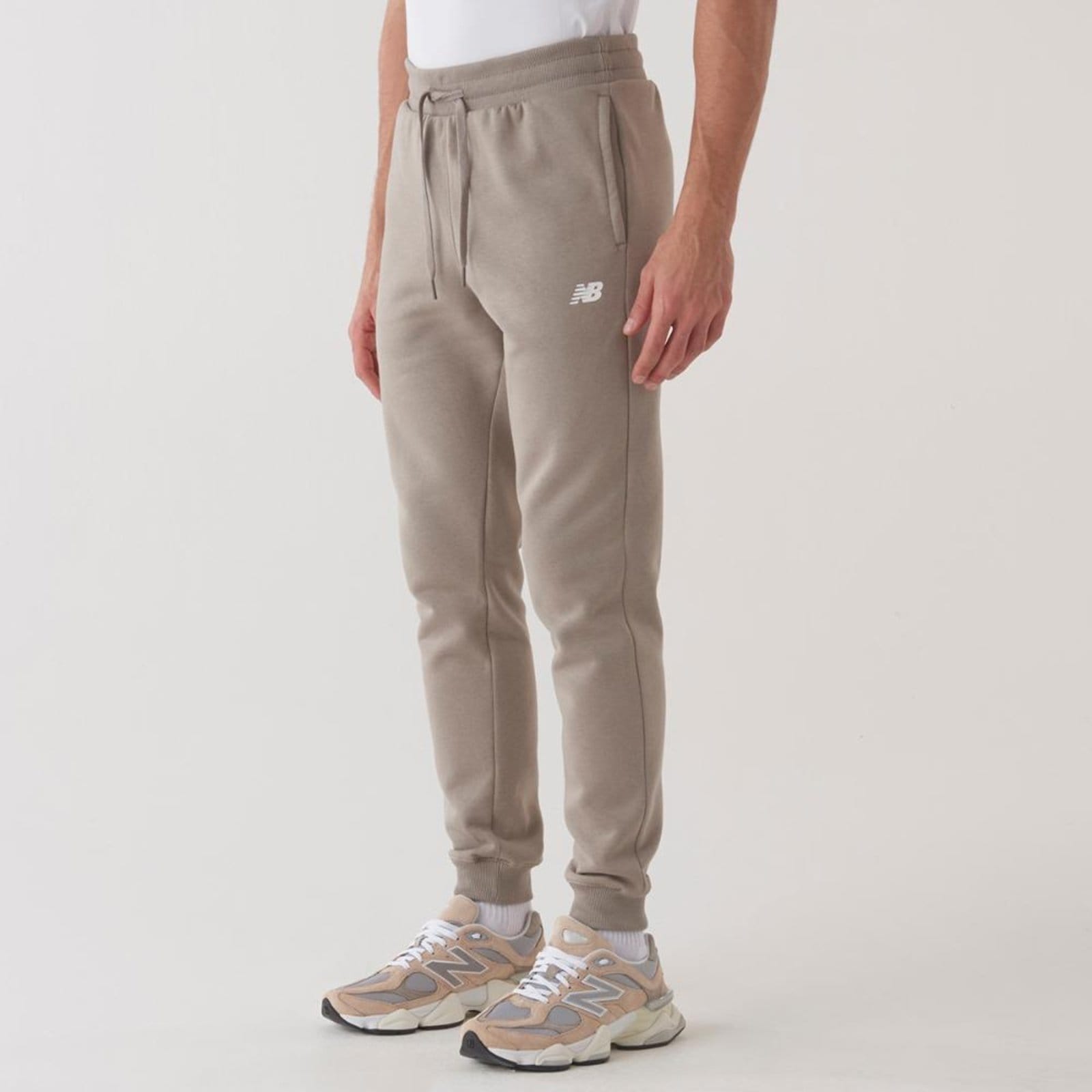 Vista 2 Calça Essentials Masculina New Balance incolor