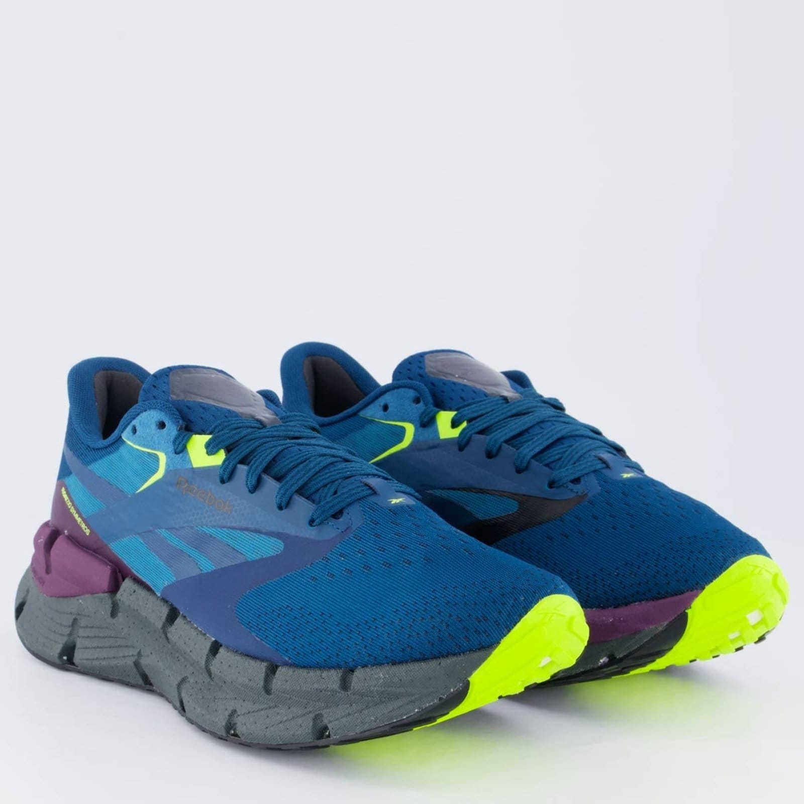 Vista 2 Tênis Reebok Floatzig Symmetros e Preto Reebok azul