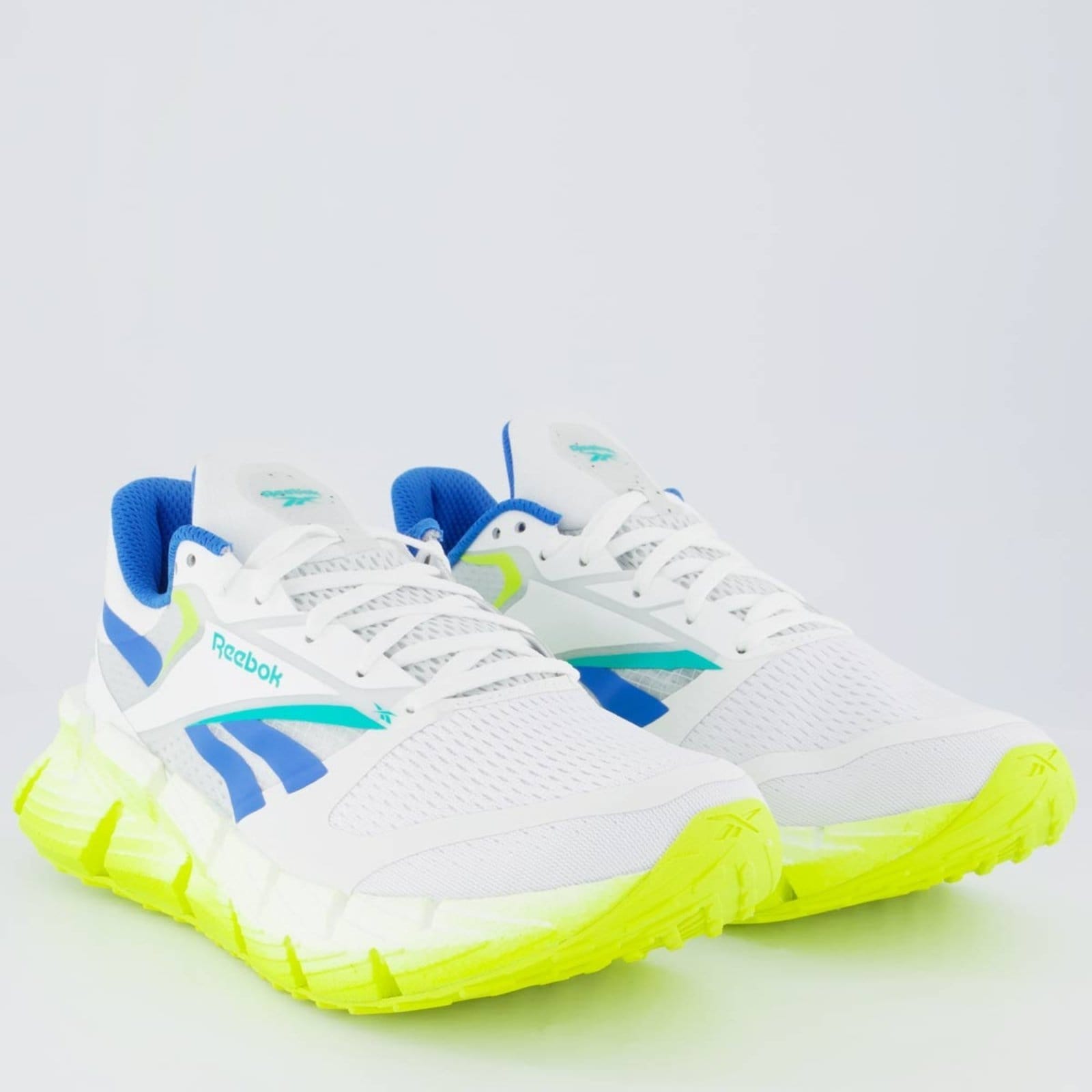 Vista 2 Tênis Reebok Floatzig 1 Branco e Azul Reebok branco azul