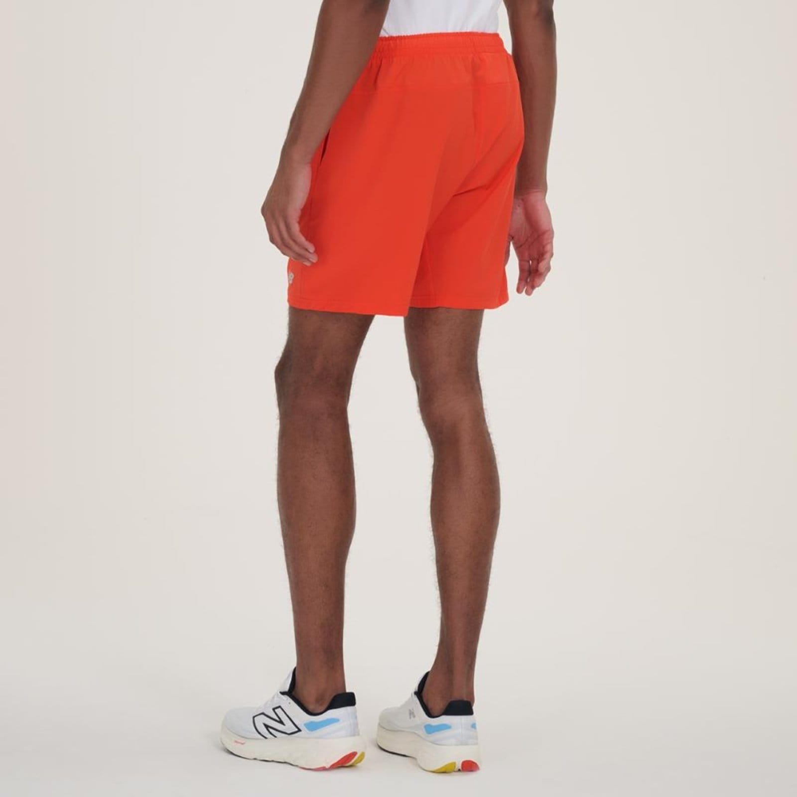 Vista 2 Bermuda Sport Essentials 7" Masculina" New Balance incolor