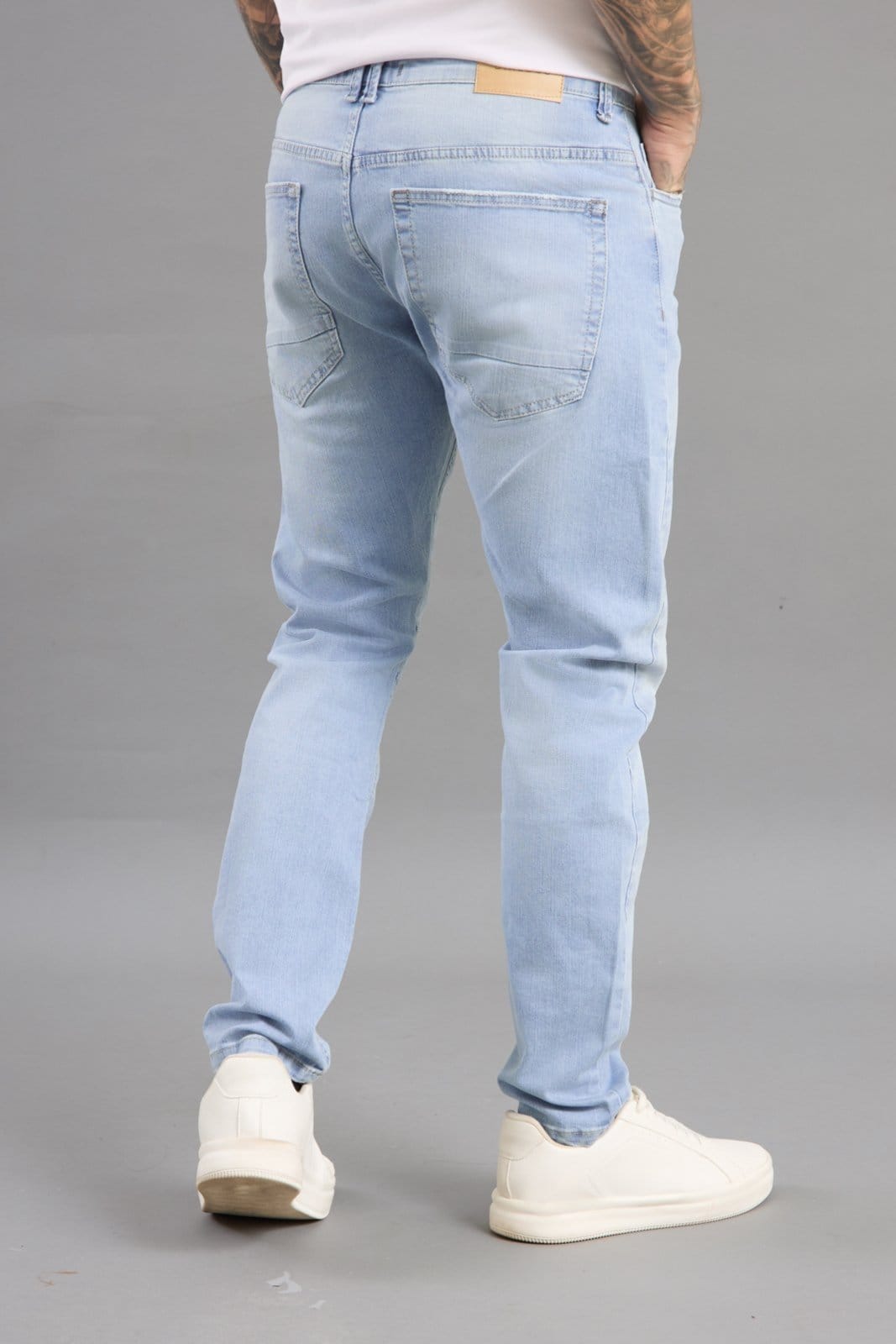 Vista 2 Calça Jeans Slim Arqueada Masculina Lavagem Clara DIALOGO azul