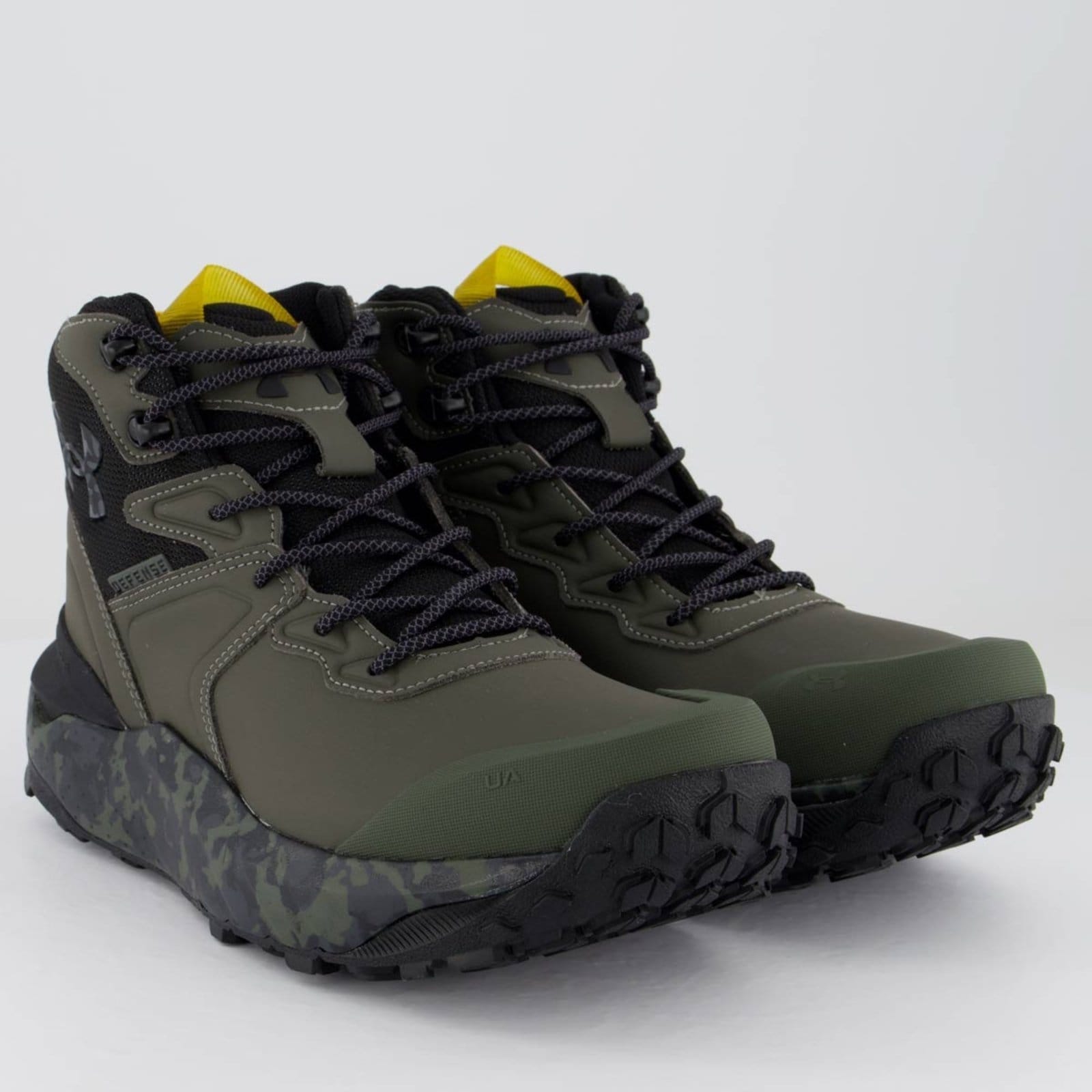 Vista 2 Tênis Under Armour Defense Mid Under Armour verde