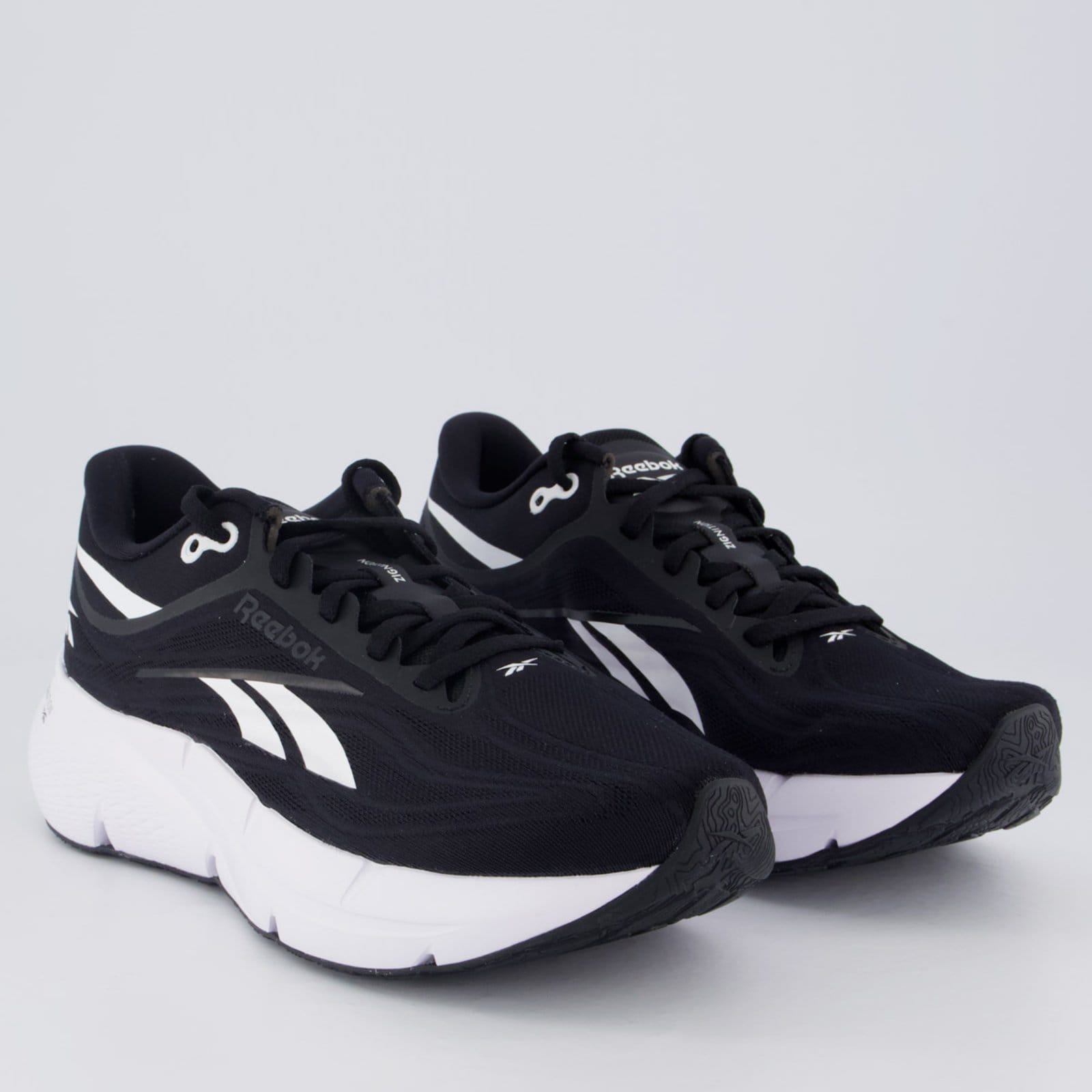 Vista 2 Tênis Reebok Zignition e Branco Reebok preto