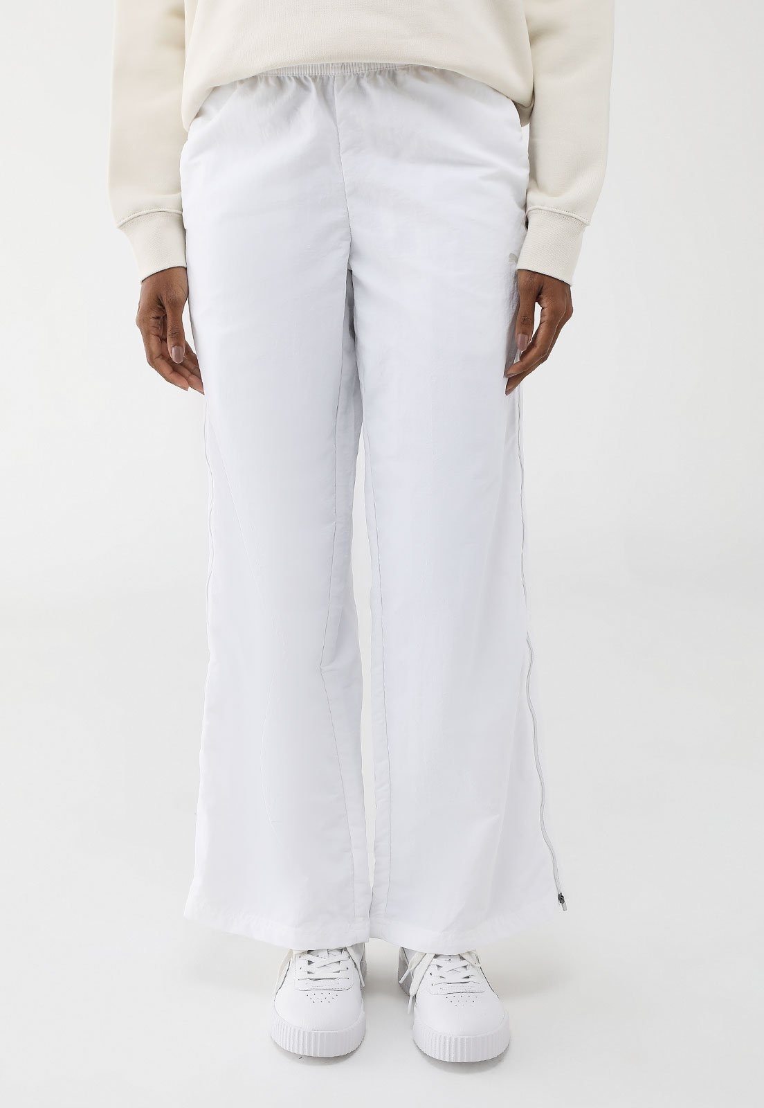 Imagem principal Calça Puma Dare To Relaxed Woven Zip-Off Branca Puma branco